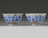 A pair of Chinese famille rose bowls