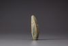A celadon and russet jade hand tool