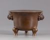 A Chinese bronze tripod censer