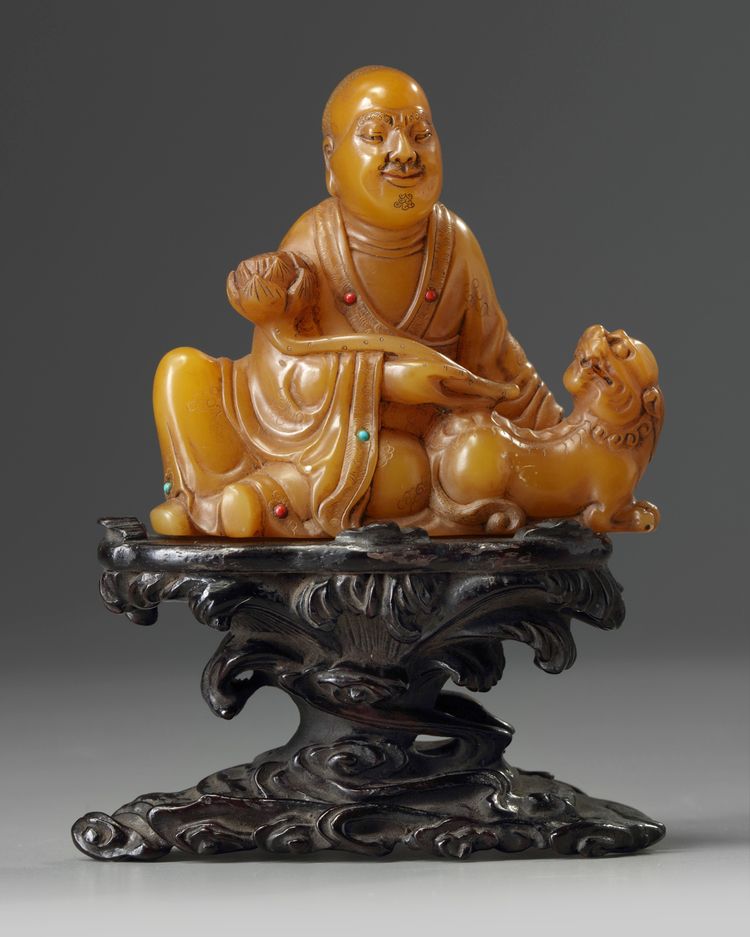 A Chinese soapstone carving of a Luohan