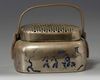 A Chinese brass 'narrative' hand warmer