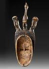 AN AFRICAN MASK WITH BIRD CREST, EARLY 20TH CENTURY