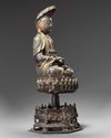 A CHINESE GILT-LACQUERED BRONZE FIGURE AVALOKITESVARA 