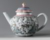 A Chinese famille rose moulded 'floral' teapot and cover