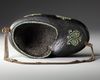 A QAJAR COCO-DE-MER BEGGAR'S BOWL (KASHKUL), PERSIA, 19TH CENTURY