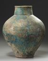 A large Islamic Seljuq turquoise glazed baluster vase