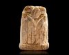 A CARVED IVORY CHESS PIECE, EGYPT OR IRAQ, 10TH-11TH CENTURY