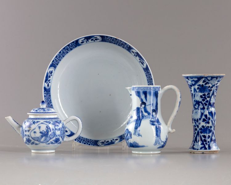 A group of four blue and white objects