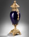 A GILT BRONZE MOUNTED SEVRES STYLE PORCELAIN VASE, 19TH CENTURY