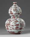 A Chinese underglaze red decorated double gourd vase