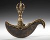 A GILT TIBETAN BRONZE KARTIKA OR VAJRA KNIFE, CIRCA 1900