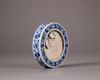 A Chinese blue and white circular inkstone