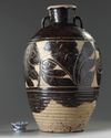 A Chinese carved Cizhou pottery jar