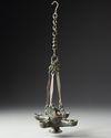 A BYZANTINE FOUR SPOUTED LAMP, 6TH-7TH CENTURY AD