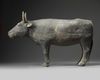 A RARE CHINESE PAINTED POTTERY FIGURE OF AN OX, HAN DYNASTY (206 BC-220 AD)