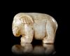 A PALE CELADON JADE ELEPHANT, CHINA, HAN DYNASTY (206 BC–220 AD)
