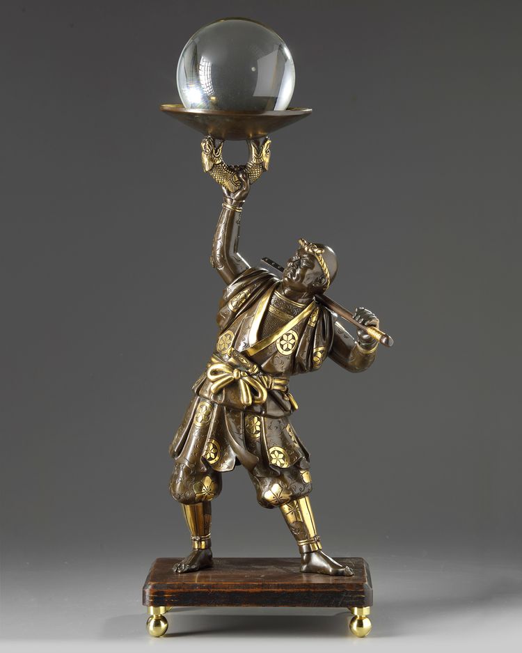 A Japanese bronze figure of a Samurai