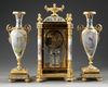 A FRENCH ORMOLU AND PORCELAIN CLOCK GARNITURE, 19TH CENTURY