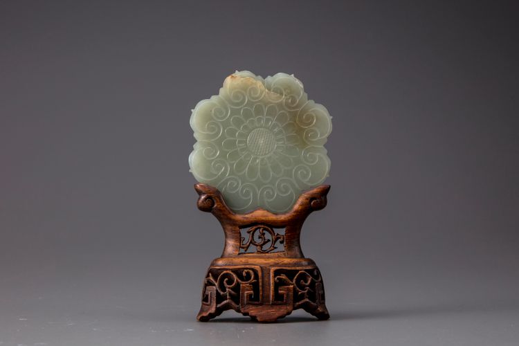 A celadon jade floral plaque