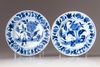 TWO CHINESE BLUE AND WHITE SAUCERS