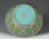 A  LARGE FAMILLE ROSE GREEN-GROUND BOWL DAOGUANG SIX-CHARACTER SEAL MARKS IN IRON RED AND OF THE PERIOD (1821-1850)