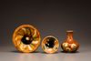 THREE CHINESE SANCAI-GLAZED POTTERY VESSELS, TANG DYNASTY (618-907)