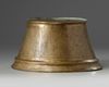 A brass Mamluk candle base
