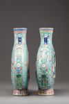 A matched pair of Chinese turquoise-ground famille rose moonflasks