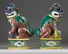 A LARGE PAIR OF CHINESE GLAZED-BISCUIT FAMILLE-VERTE FIGURES OF BUDDHIST LIONS, QING DYNASTY, 19TH CENTURY