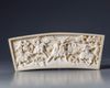 A Chinese ivory plaque depicting a warrior scene