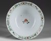 A CHINESE FAMILLE VERTE 'CRANE AND PEACH' BOWL