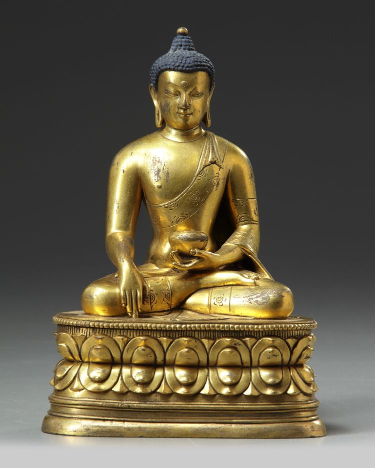 A gilt Chinese figure of Vajrasana