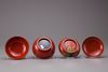 Ten Japanese red lacquered bowls with wooden box