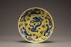 A yellow-ground blue and white 'dragon' dish