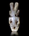 A GREENISH-YELLOW JADE OF A HUMANOID FIGURE, CHINA, HONGSHAN CULTURE