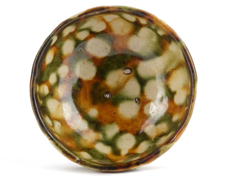 A SMALL CHINESE SANCAI GLAZED BOWL, TANG DYNASTY (618-907)