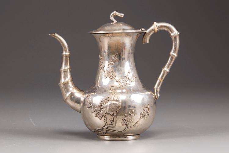 A Chinese export silver 'bird and flower' coffee pot