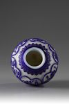 A Chinese blue overlay white glass 'floral' jar