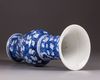 A Chinese blue and white 'prunus on cracked ice' phoenix tail vase