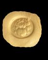 A RED JASPER INTAGLIO WITH A GRYLLOS WITH FOUR HEADS, ROMAN 1ST CENTURY AD