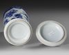A CHINESE BLUE AND WHITE BELL-SHAPED COVERED VASE, QING DYNASTY (1644-1911)