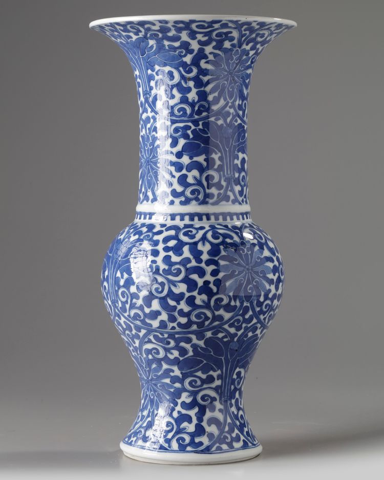 A Chinese blue and white 'scrolling lotus' phoenix tail vase