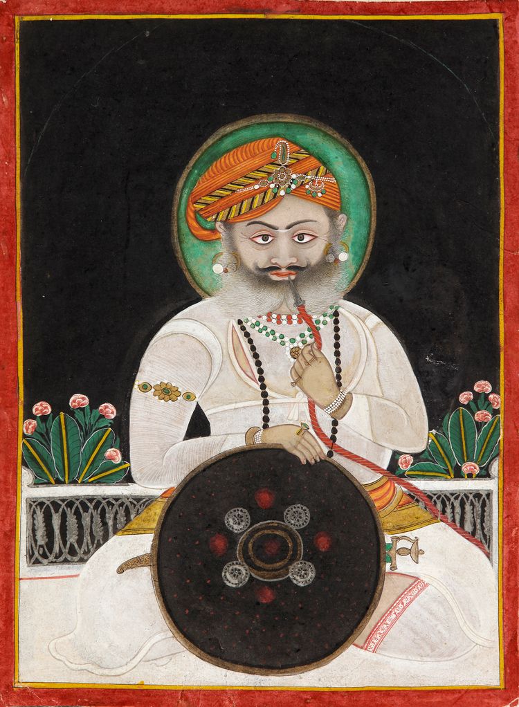 A PORTRAIT OF A RAJA SMOKING A HUQQA MEWAR, NORTH INDIA, MID-19TH CENTURY