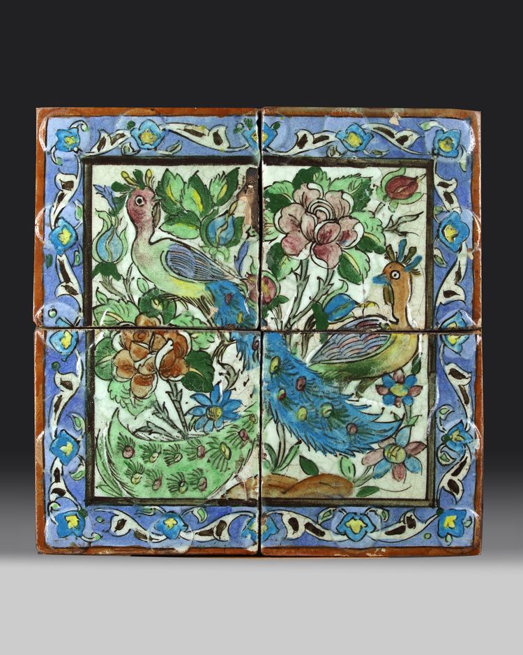 A QAJAR MOULDED POTTERY TILES PANEL, PERSIA, 19TH-20TH CENTURY