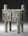 A CHINESE ARCHAIC BRONZE RECTANGULAR FOOD VESSEL, SHANG DYNASTY (CIRCA 1600-1100 BC)