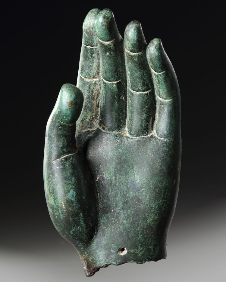 A CHINESE BRONZE BUDDHA'S HAND, PROBABLY MING DYNASTY