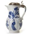 A SILVER MOUNTED CHINESE BLUE AND WHITE MOULDED MILK JUG, KANGXI PERIOD (1662-1722), THE SILVER MARKED 18TH CENTURY