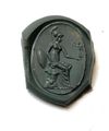 A LARGE ROMAN GOLD RING WITH A BLACK JASPER INTAGLIO OF MINERVA/ATHENA, 1ST CENTURY AD