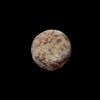 AN EARLY ISLAMIC GLASS WEIGHT OF HALF DIRHAM