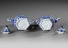 A PAIR OF CHINESE BLUE AND WHITE HEXAGONAL EWERS AND COVERS, KANGXI PERIOD (1662–1722)